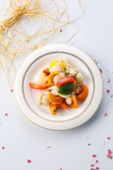 French style scallops with spicy peppers served in exquisite tableware