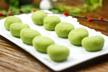 Rectangular porcelain plate with coconut and green mango