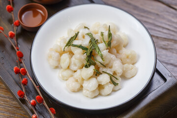 West Lake Longjing shrimps on wooden tray