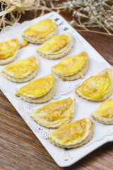 Delicious durian pastry in a rectangular white porcelain plate