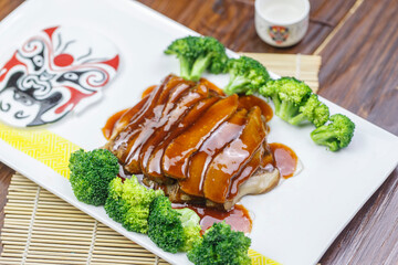 Large conch slices with teriyaki sauce