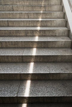 Urban Staircase with Diagonal Beam of Sunlight