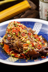 Spicy Sichuan style braised pork elbow