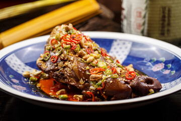 Spicy Sichuan style braised pork elbow