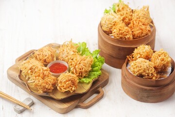 Udang Rambutan. Rambutan Shrimp is a type of fried dimsum, ball-shaped and filled with chopped chicken and shrimp.