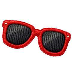 Red Stitched Sunglasses Patch on Black Background Close up