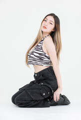 Fashion asian attractive pretty young woman model poses confidence wear zebra print halter top,...