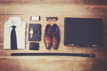 High angle view of personal accessories arranged on table