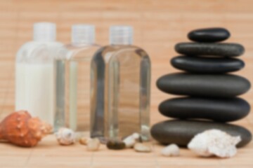 Oils with pebbles on table