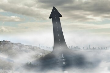 Flat design showing arrow-shaped road rising in fog over rocks with dashed markings toward skyline