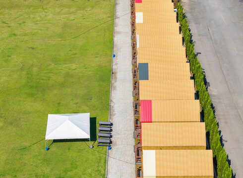 Aerial View of Camping Area with Tent and Cabins
