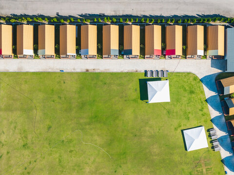 Aerial View of Campsite Cabins and Lawn with Tents