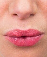 Obraz premium Close up of female mouth kissing