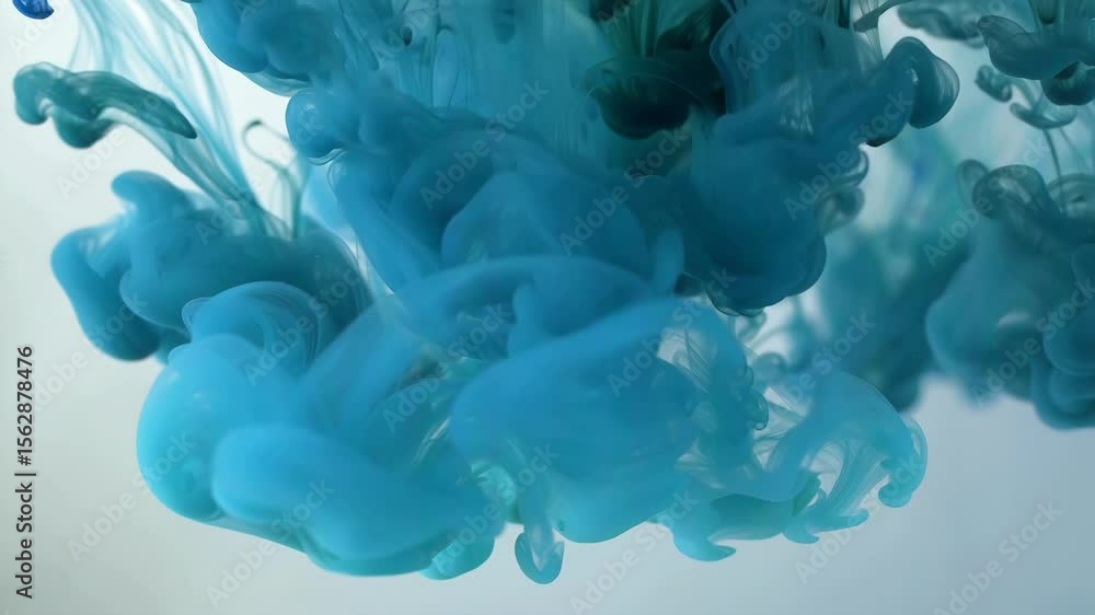Poster abstract swirling patterns of blue-green ink mixing in water, creating mesmerizing shapes and textur