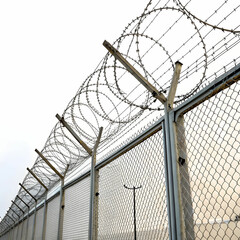 fence with barbed wire