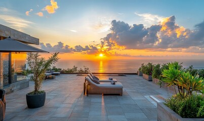 Obraz premium Rooftop sun loungers at sunrise over ocean view