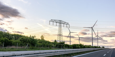 Wind turbines and power lines. Alternative electricity