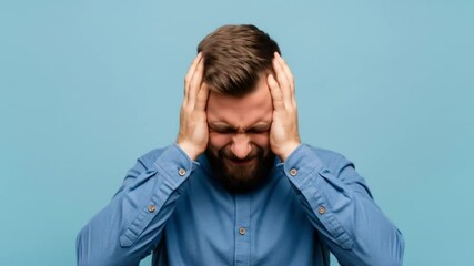 man over isolated background suffering from headache desperate and stressed because pain and migraine. - Powered by Adobe