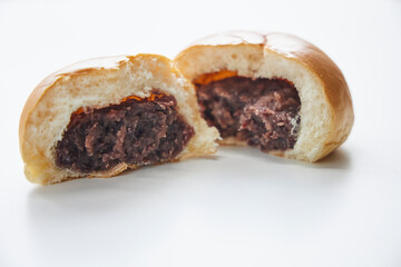 Anpan. White background. Grain bean jam. Japan. Japanese food. Japanese sweets. Sweet bread. Snacks. Sweets.