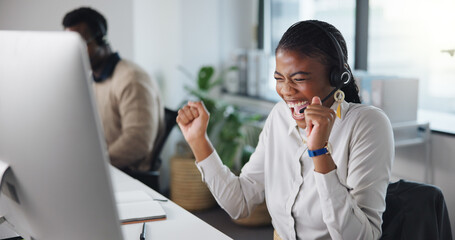 Fist pump, call center and woman celebrate on computer for online bonus, promotion and good news....