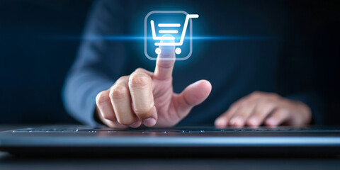 E-commerce web button order concept. A hand interacts with a digital shopping cart icon over a keyboard, symbolizing online shopping and e-commerce technology.