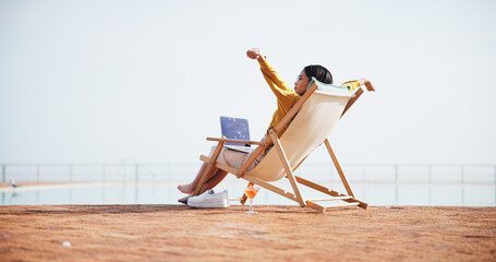 Outdoor, stretching or woman with laptop in resort for freelance, online review or tourism blog. Finish, done or digital nomad with technology for complete remote work, break or travel space to relax