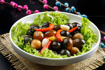 Delicious cold dish: preserved eggs and quail eggs