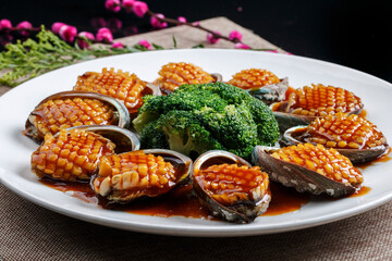 Seafood sashimi live abalone in rectangular white porcelain plate