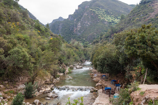 Empty Tables and Chairs Line the River in Akchour Morocco