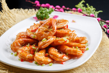 Kung Pao large shrimps on a white porcelain plate