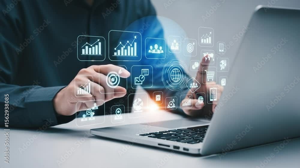 Aufkleber person using laptop with digital business icons floating above the keyboard and touchpad area