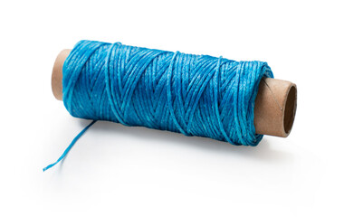 spool of sewing thread close up on white background