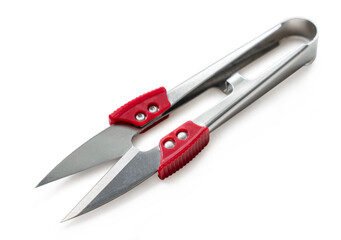 professional thread cutting scissors close-up on white background