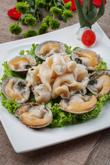 Sashimi swan eggs on a white porcelain plate