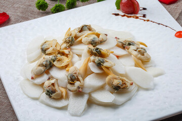 Steamed mussels with long yam in white square porcelain plate