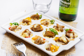 Japanese style iron plate baked snails with cheese