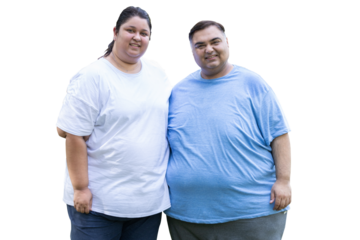 Happy fat indian couple standing together. Plus size man and woman looking camera. Overweight people india. Obesity concept.