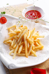 French fries on white porcelain plate