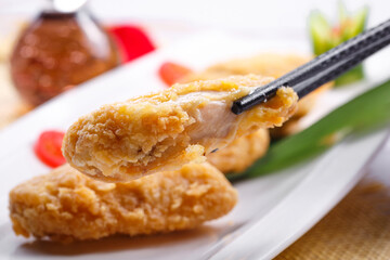 Fried chicken wings on a white porcelain plate