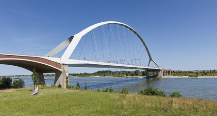 Modern white arch bridge 