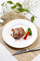 French fried fillet steak on English wrapping paper