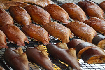 Delicious Smoked Fish Displayed on a Grill for Fresh Seafood Presentation