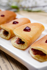Blueberry sandwich pie on English wrapping paper
