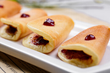 Blueberry sandwich pie on English wrapping paper