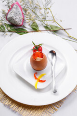 Steamed egg with crab roe on iron plate on white background