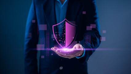 Person holding glowing purple shield with circuit patterns, symbolizing cybersecurity, data protection, privacy, and secure digital technology solutions.