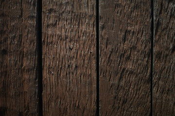 Wooden walls. Gardening. Old woodblocks. Brown wood.
