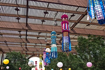 Hanging, colorful, decorations in a Japanese garden. Phoenix, Arizona.