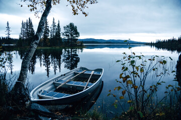 Boat on a Lake near Mountains
