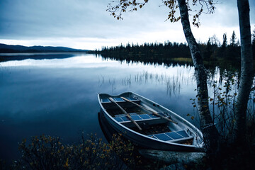 Boat on a Lake near Mountains